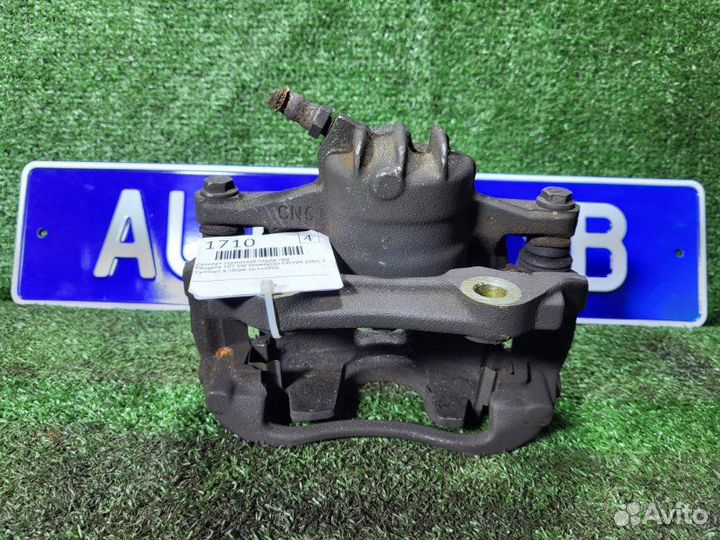 Суппорт тормозной передний левый Peugeot 307 Sw