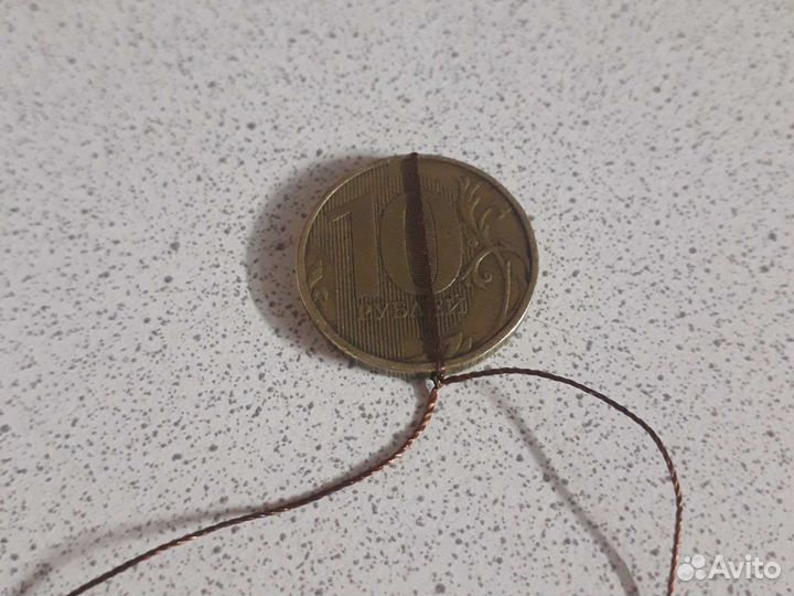 Монета 10р брак 2011г поворот