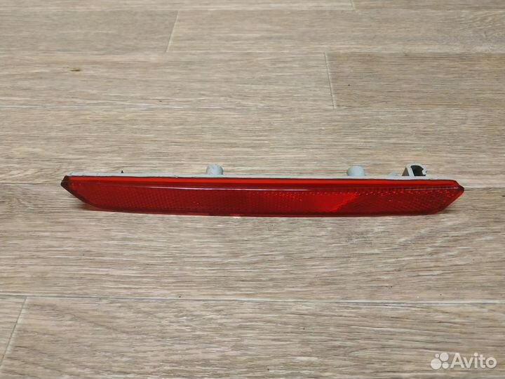 Отражатель в бампер задний левый Mazda 3 BK