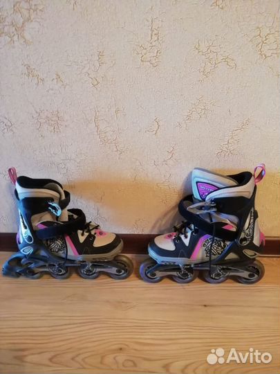 Роликовые коньки