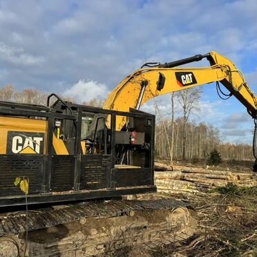 Гусеничный харвестер Caterpillar 320