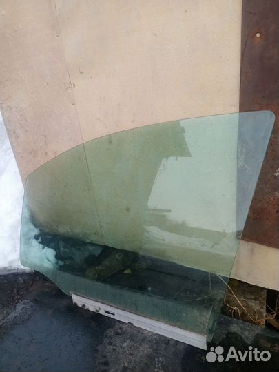 Стекло двери переднее левое Opel Zafira A