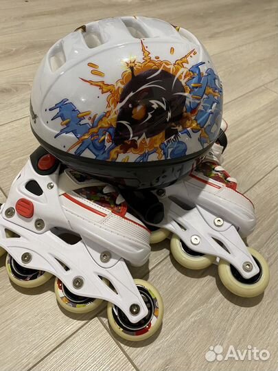 Роликовые коньки