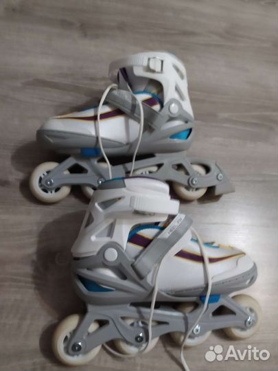 Роликовые коньки