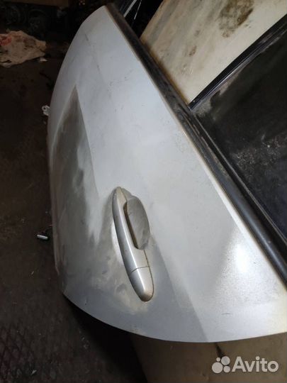 Задняя левая дверь Kia carens 2