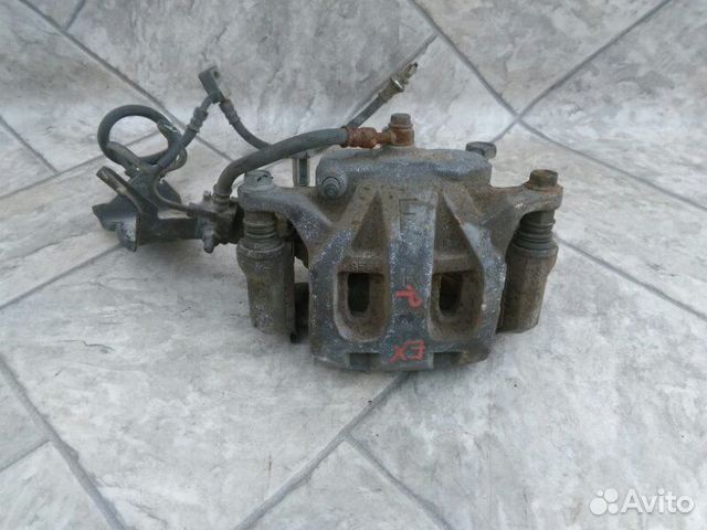 Суппорт тормозной передний правый Infiniti Ex