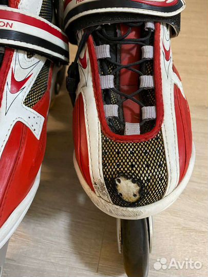 Роликовые коньки