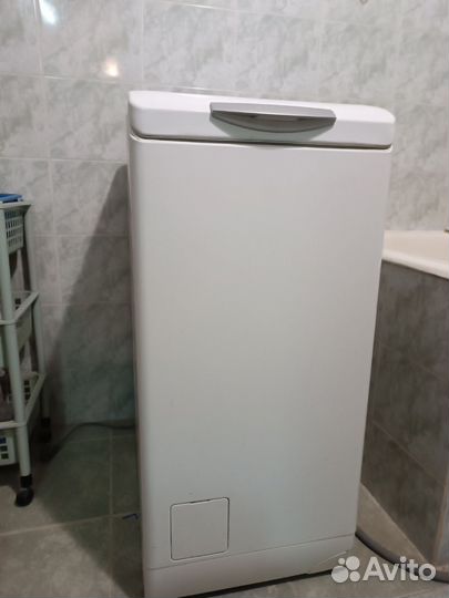 Стиральная машина с вертикальной загрузкой