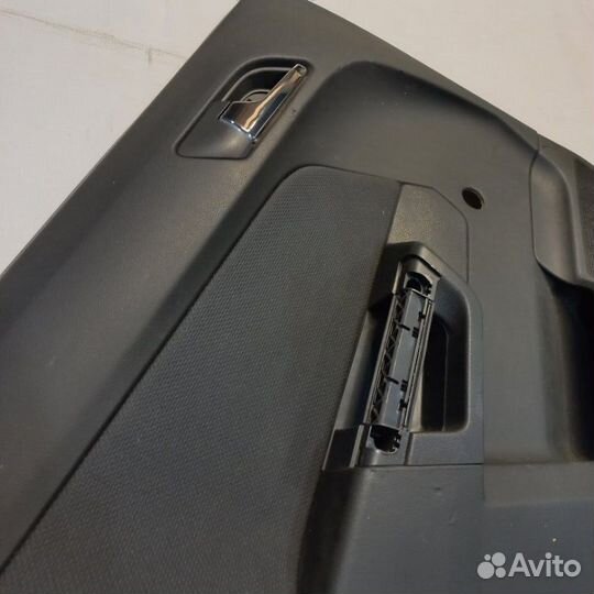 Обшивка двери задняя левая Opel Astra H