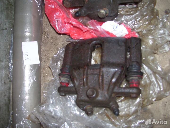 Ниссан микра К 12 суппорт