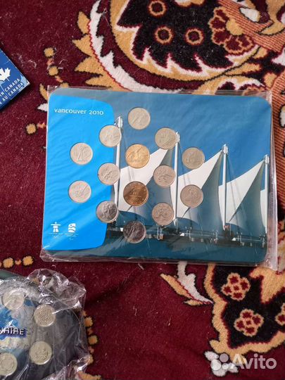 Наборы монет Канады и Бразилии