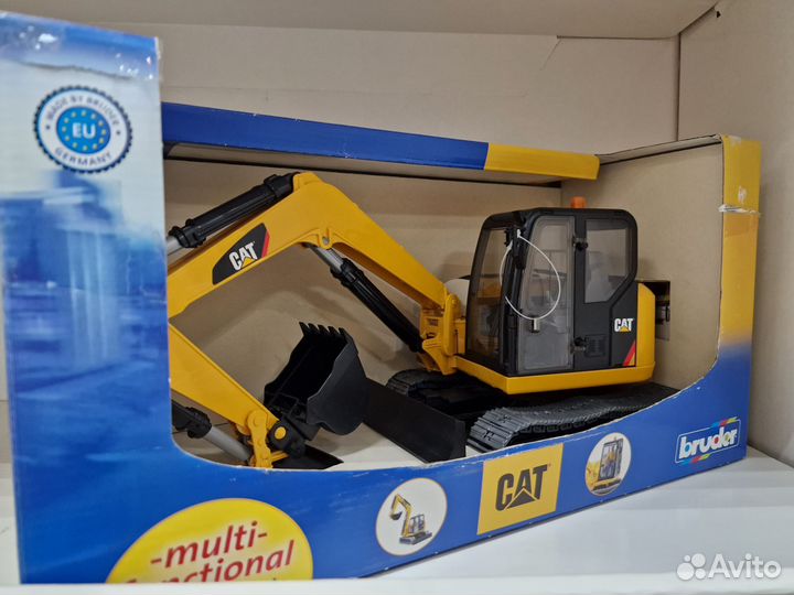 Игрушка Экскаватор гусеничный CAT с отвалом Bruder