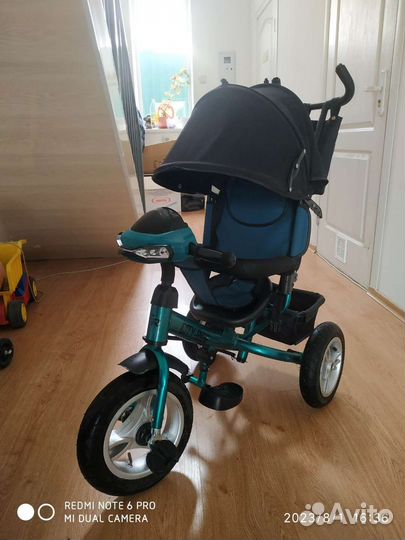 Трехколесный велосипед с родительской ручкой