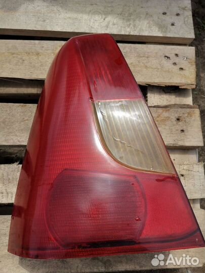 Задний стоп левый Рено Логан