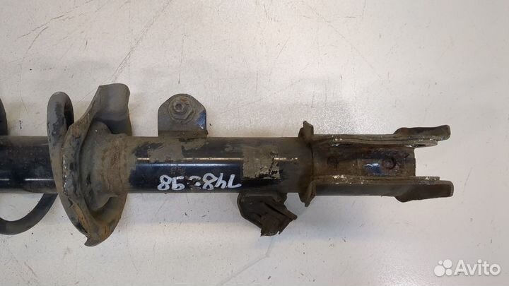 Амортизатор подвески левый передний Nissan Note E12 2012