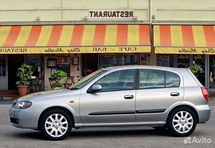 Трос тросик ручника левый Nissan Almera N16