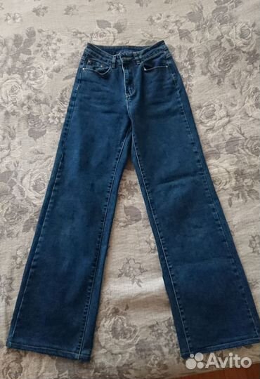 Джинсы широкие