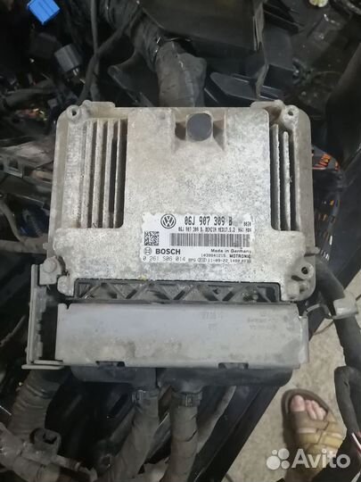 Блок управления двигателем Vw Passat B7 06J907309B