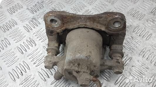 Суппорт тормозной задний левый toyota RAV 4 ZSA3