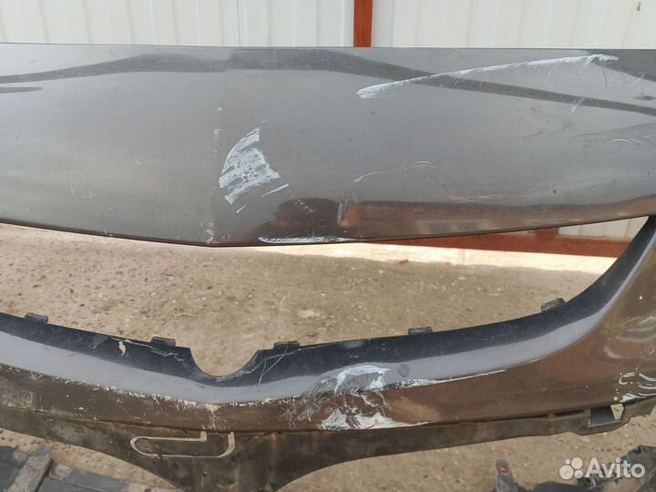 Передний бампер Opel Astra j