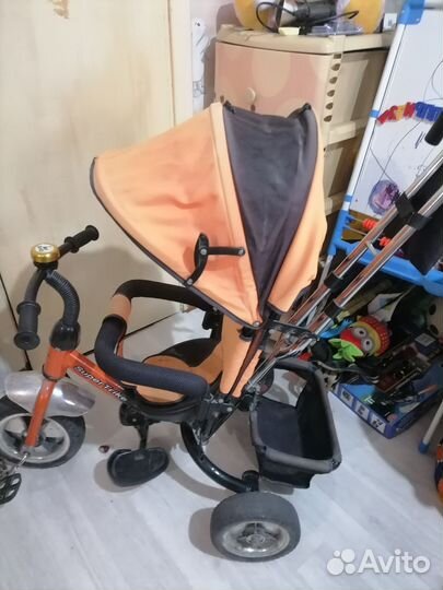 Трехколесный велосипед с ручкой