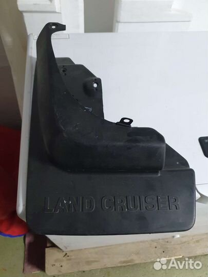 Брызговик левый задний на тлк 80