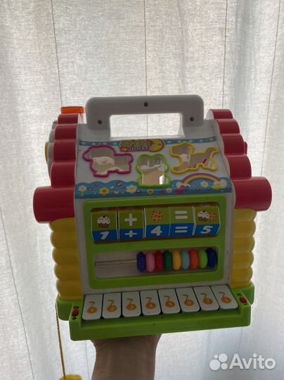 Детские игрушки пирамидка домик