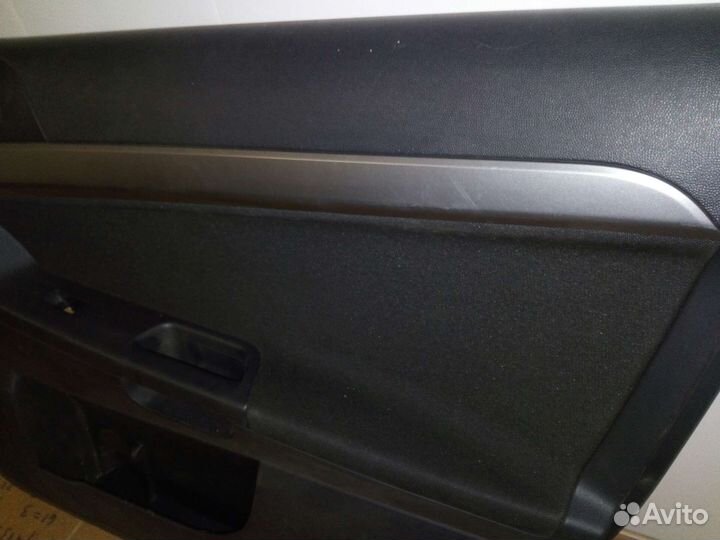 Обшивка двери Mitsubishi Lancer X 10