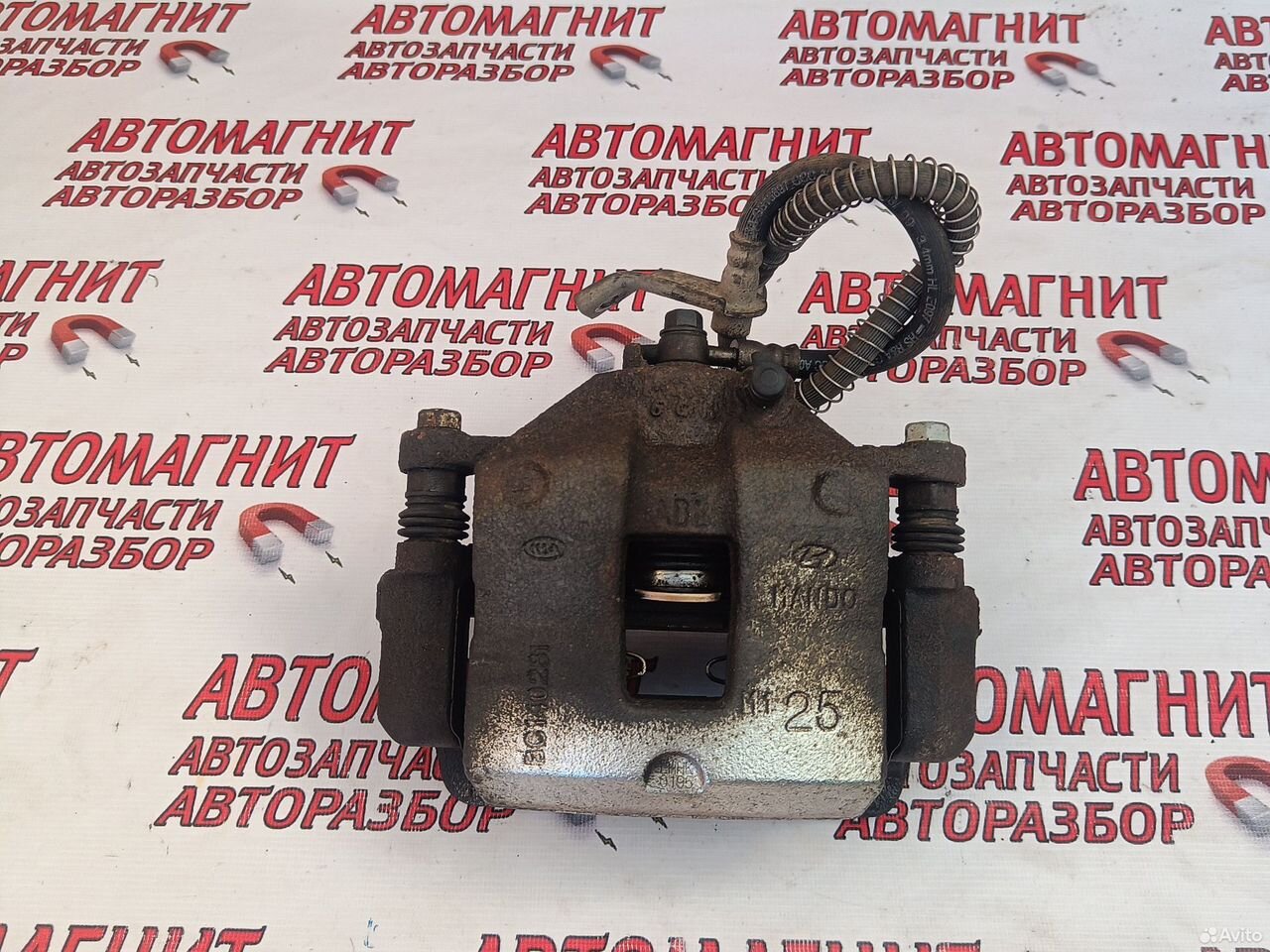 Супорт тормозной передний Хендай Элантра 6 AD