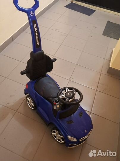 Детская машинка каталка с ручкой