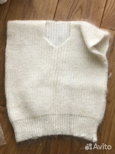 Жилетка пуховая вязаная детская