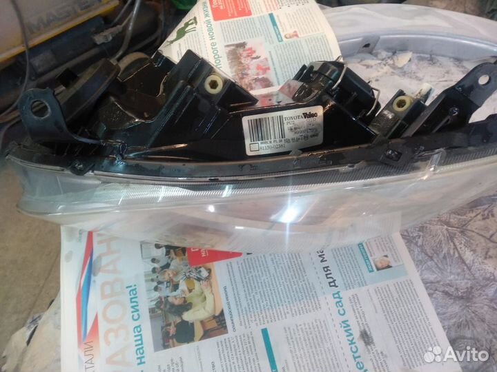 Фара toyota corolla 2005