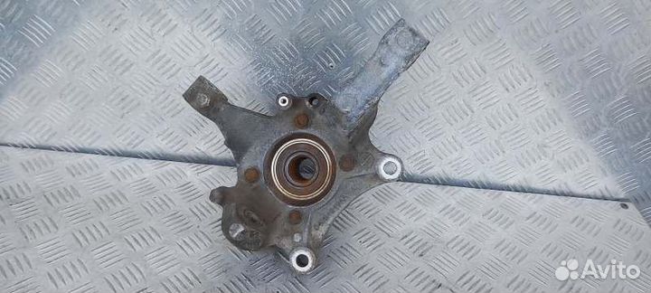 Кулак поворотный левый Chrysler Voyager Iv