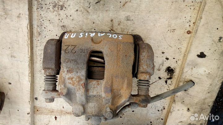 Суппорт тормозной передний Левый Хендай Солярис