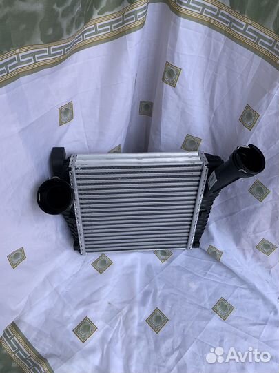 Интереклер правый VAG 7P0145804B