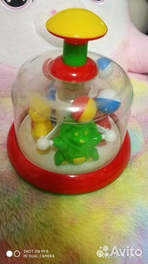 Юла -карусель игрушка