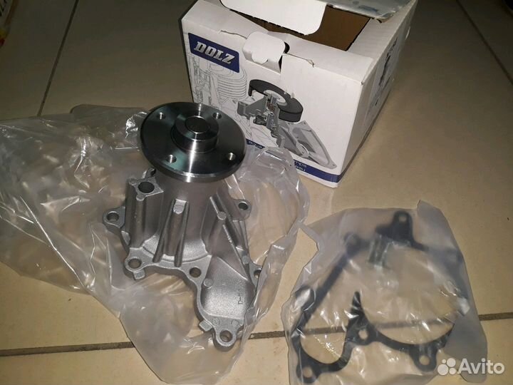 Помпа Nissan Navara Pathfinder 21010-EB30A