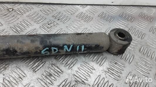 Амортизатор задней балки nissan note E11 (6DN11LX01)