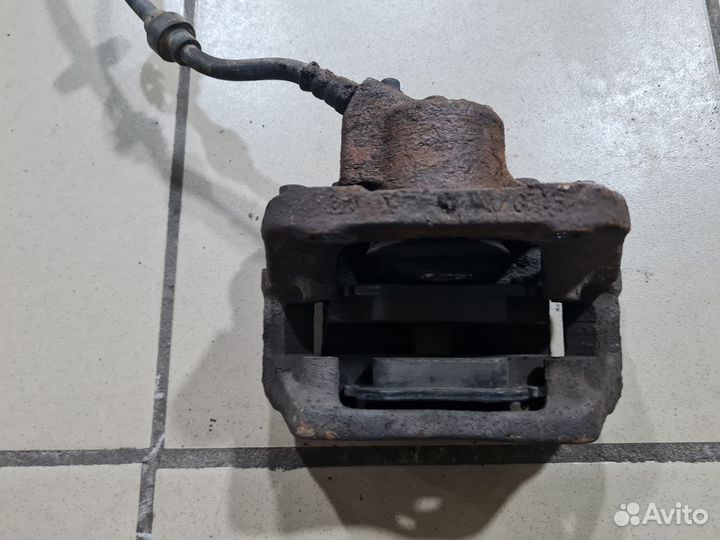 Суппорт тормозной Renault Megane I