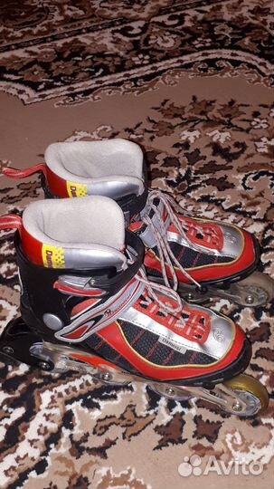 Роликовые коньки