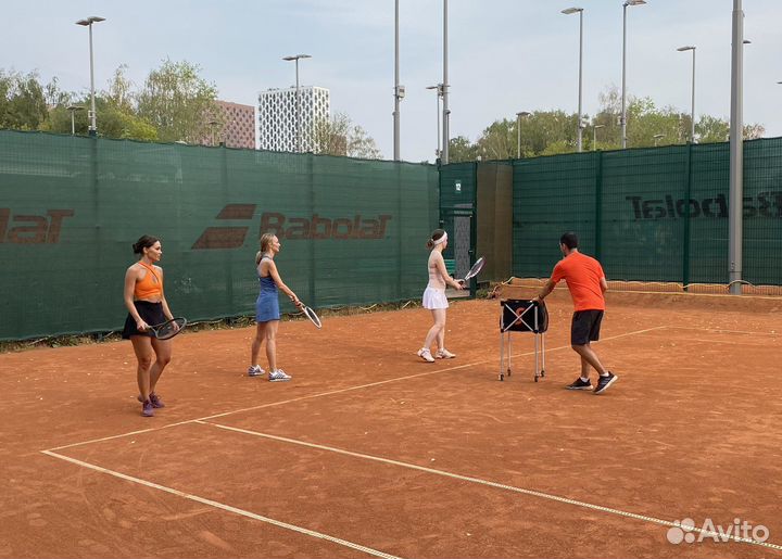 Тренер по большому теннису