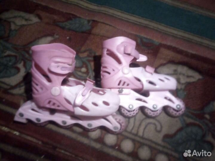 Роликовые коньки