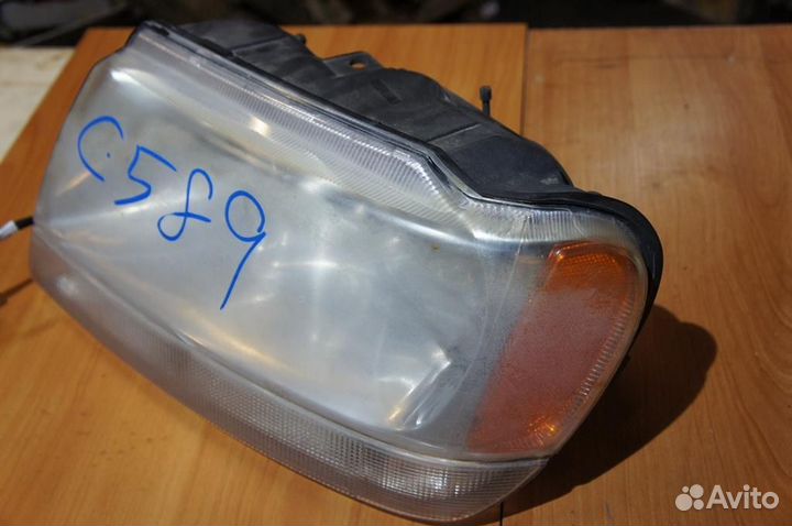 Фара левая jeep Grand Cherokee 1998-2004 4.7