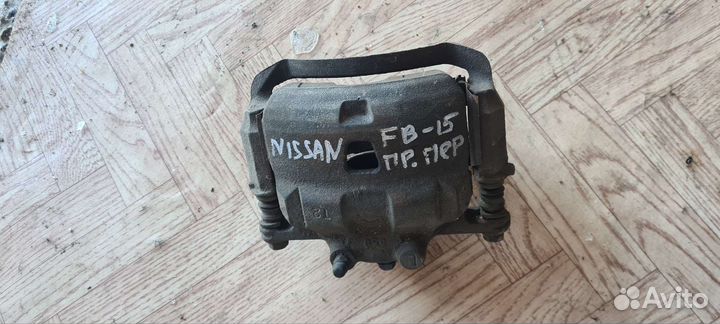 Суппорт тормозной. Nissan Sunny