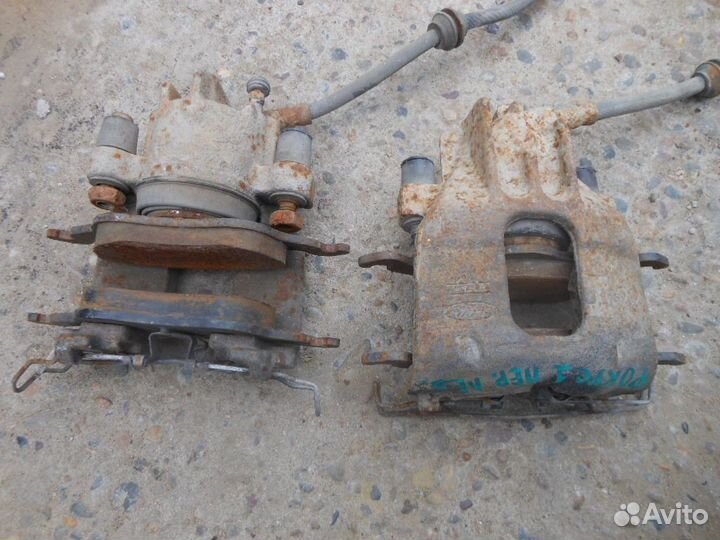 Суппорт тормозной передний для Ford Focus I