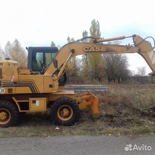 Услуга полноповоротным колёсным экскаватором case