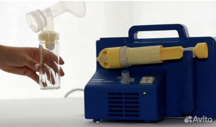 Молокоотсос Medela. Накладки на грудь в подарок