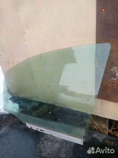 Стекло двери переднее левое Opel Zafira A
