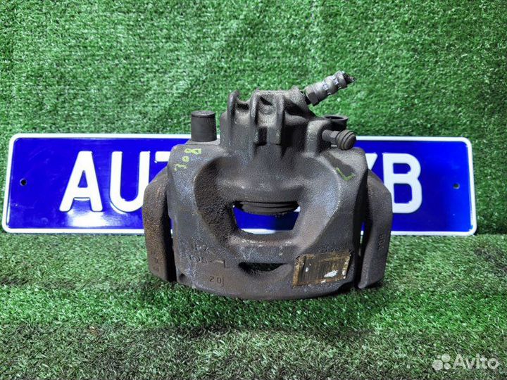 Суппорт тормозной передний левый Peugeot 308