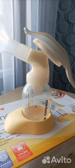 Молокоотсос medela ручной